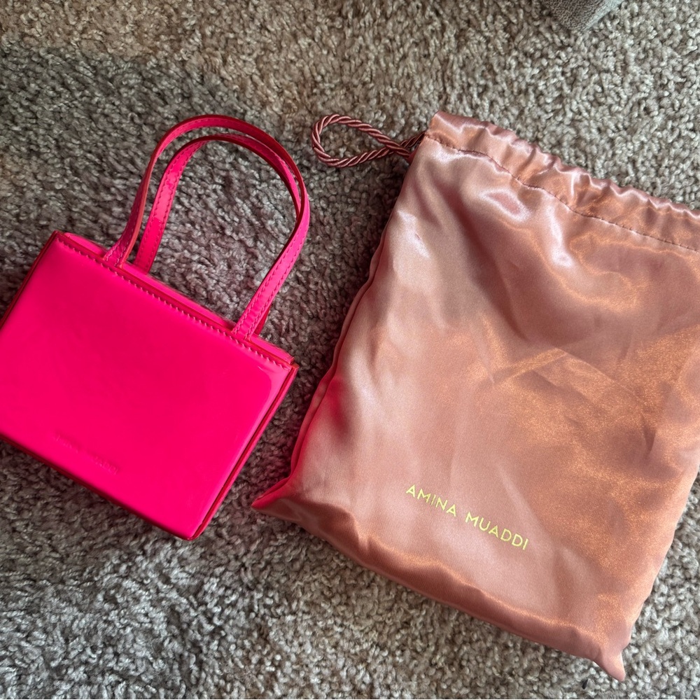 Amina Muaddi mini pink bag